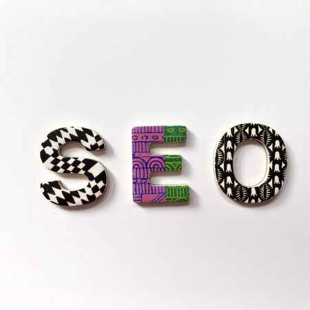 Colourful patterned letters spelling out "seo" on a plain white background.